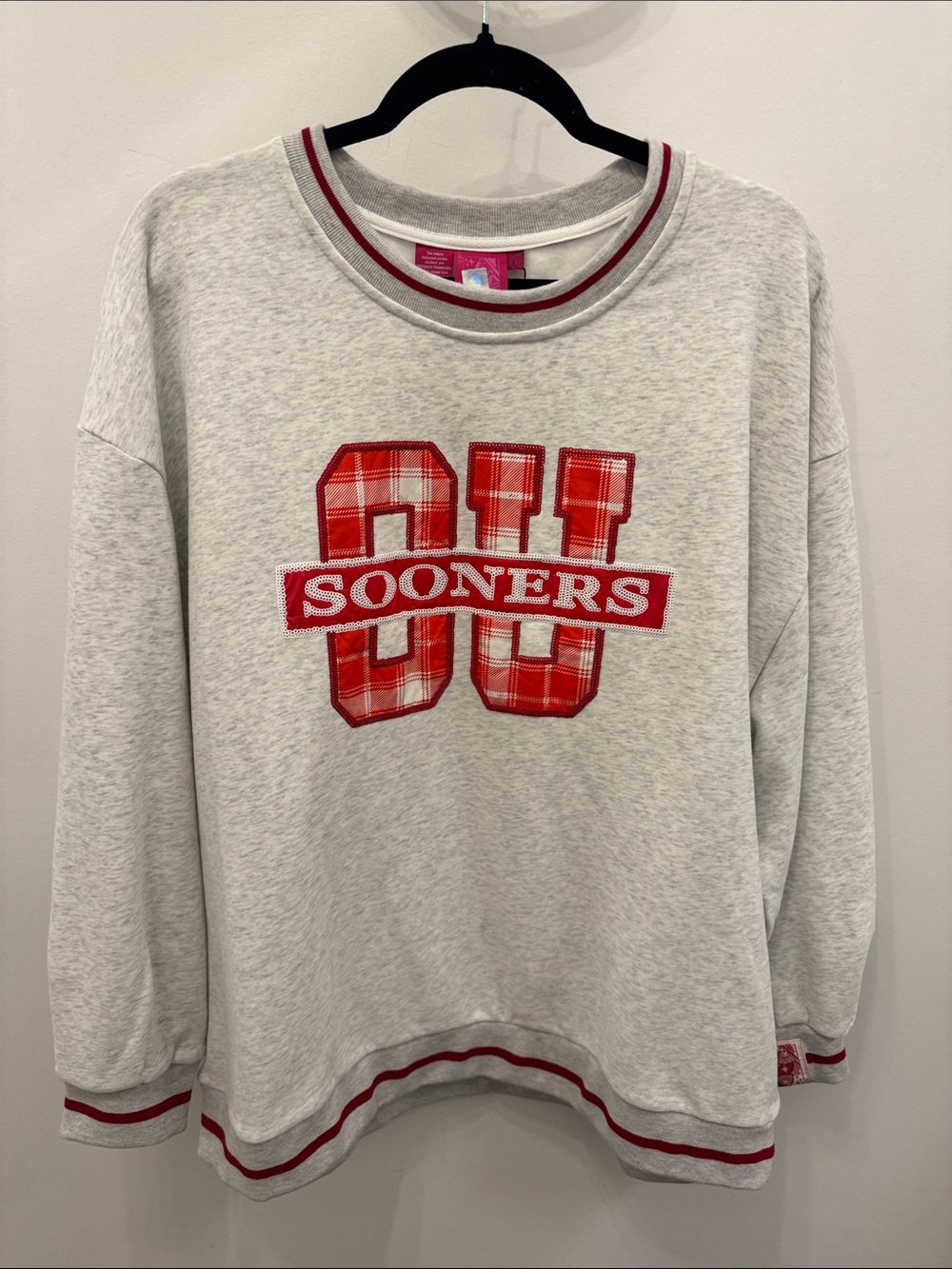 QUEEN OF SPARKLES Light Gray Crewneck Sweatshirt with Red Plaid 'OU' Appliqué